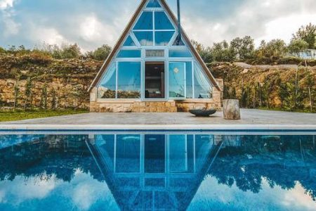 A Framed Bungalow with a Pool